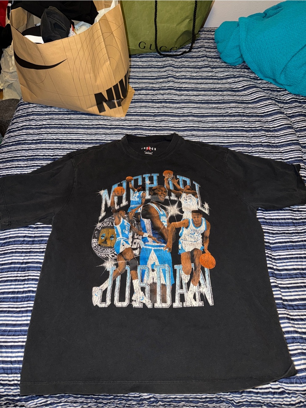 Jordan Black Short Sleeve Graphic Tee with Blue and White Accents